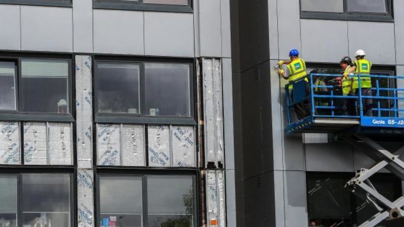 ACM cladding being removed